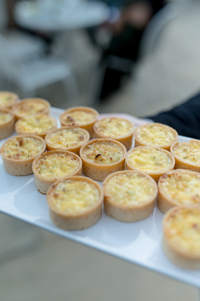 A close up of hors d'oeuvres on a white plate.