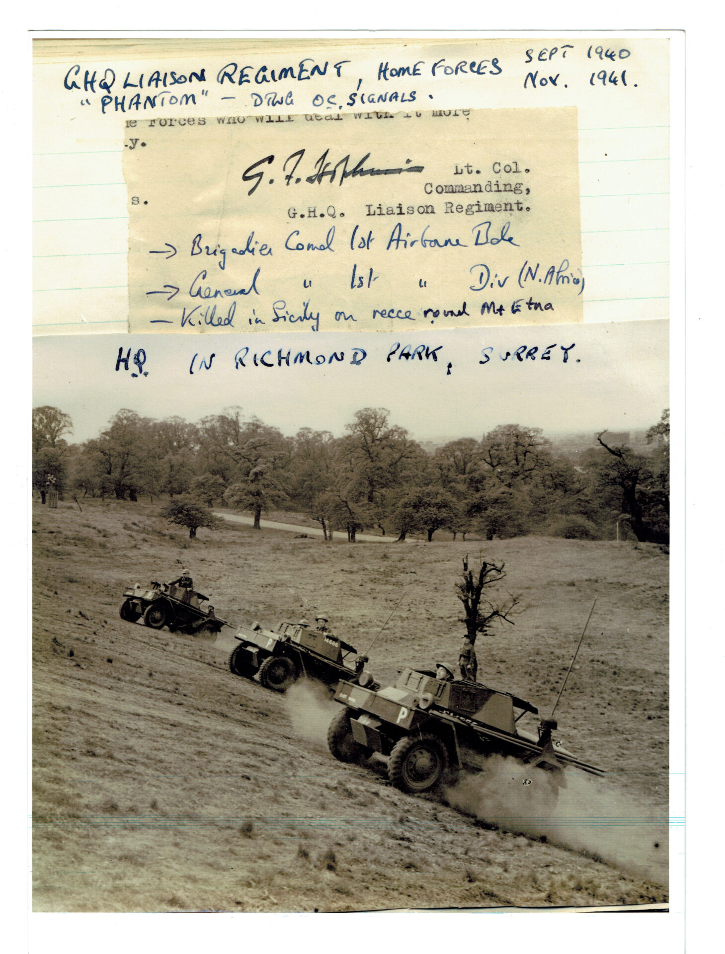 Black and white photo of military vehicles climbing a hillside in Richmond Park, Surrey. Handwritten notes about G.H.Q. Liaison Regiment are above.